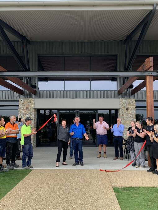 OFFICIAL: Kate O'Callaghan and Roger Commins cut the ribbon to officially open the Whitton Malt House on Wednesday morning. Photo: Contributed 