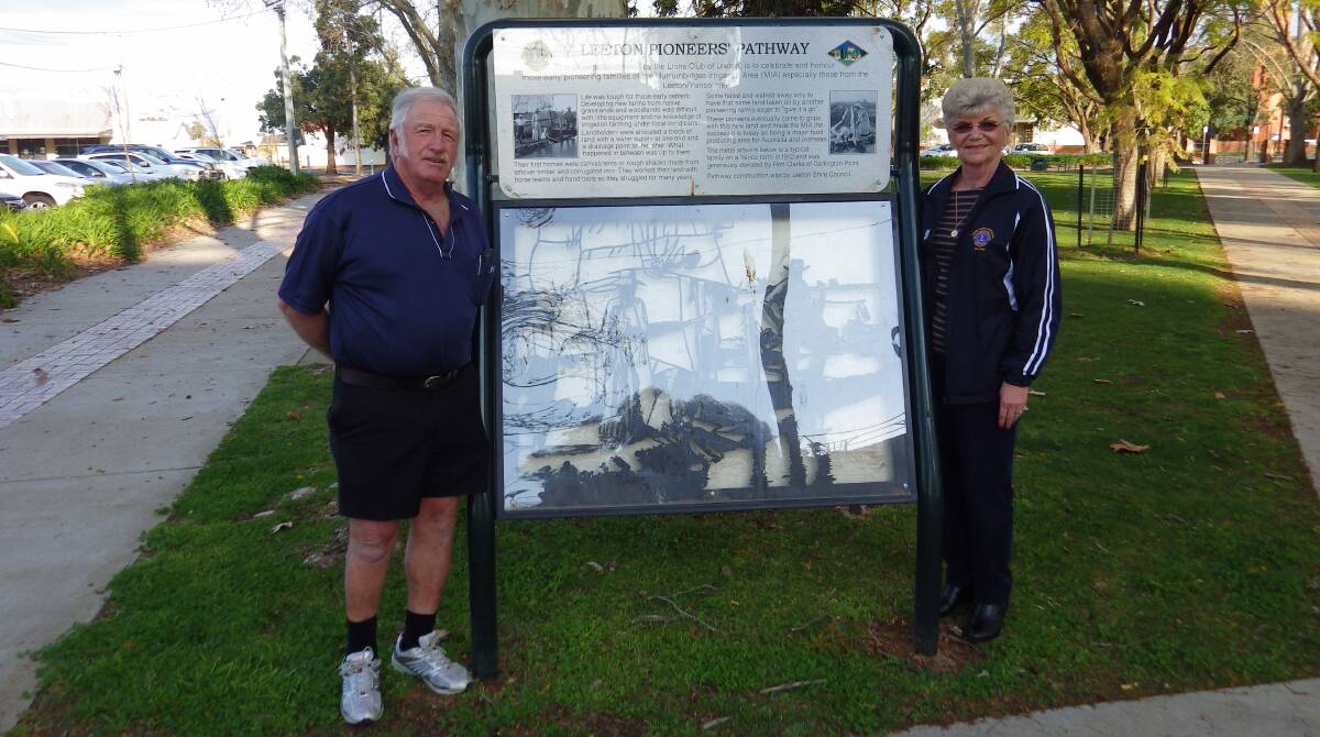 TAKING IT ALL IN: Past district governor Peter Perry (left) and vice district governor Anne Jones inspect the Lions heritage pathway in Mountford Park recently. 