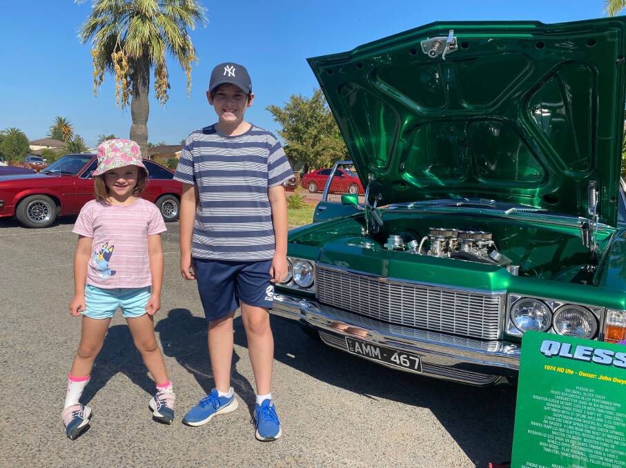 CHECKING IT OUT: Claire (left) and Alexander McIntyre had a fun morning looking at all the vehicles at the MIA Cruisers show and shine event on Easter Saturday. Photo: Talia Pattison