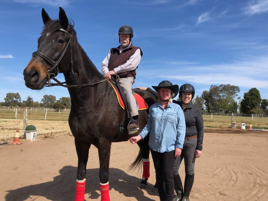 FAMILY FUN: Warren Kirkup on Zaphero, with daughters Debbie Walker and Lyndall Kirkup at H&K Equestrian. Photos: Talia Pattison 