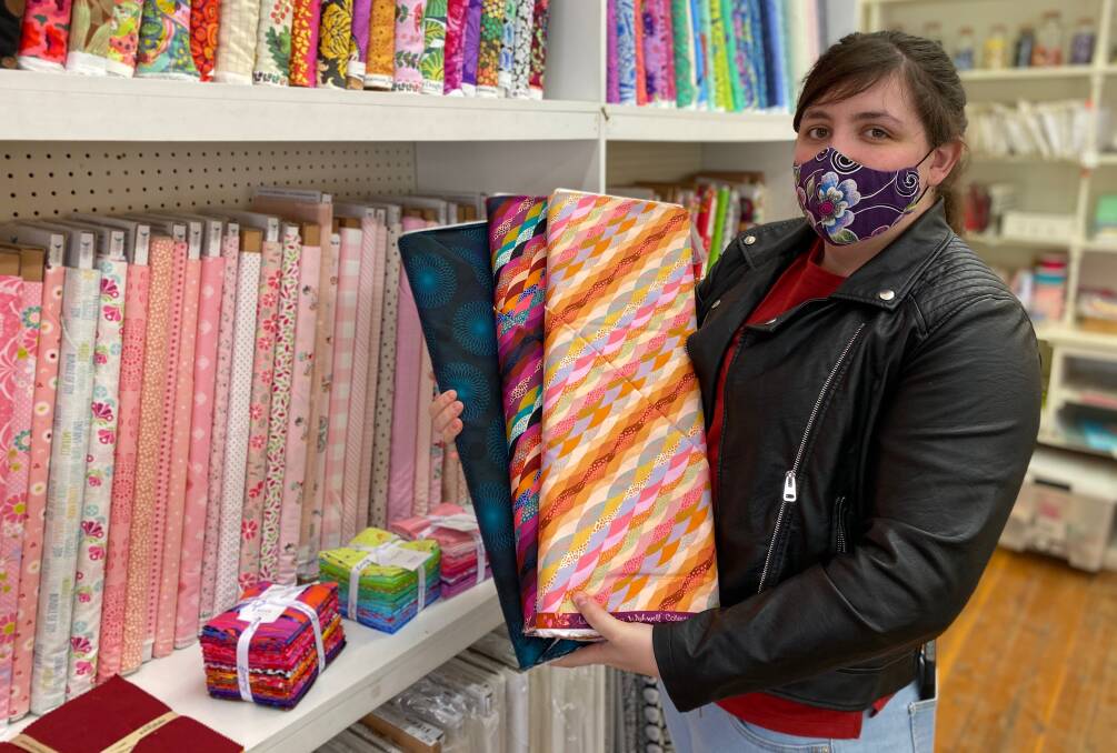 COLOURFUL: With masks here to stay for now, Leeton's Fabric Farm manager Meg Rowlands said there were plenty of options for making this neccesity fashionable. Photo: Talia Pattison