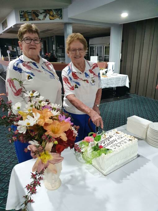 MILESTONE: Life member Edna Rice (right) cuts the cake while current president Barbara Gullotta looks on. Photo: Contributed 