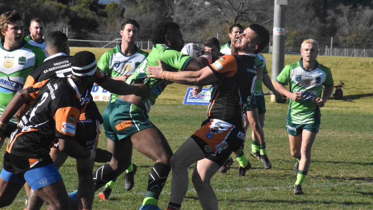 STRENGTH: Leeton's Inia Mate keeps control of the ball against the Waratah Tigers last weekend. Photo: Liam Warren
