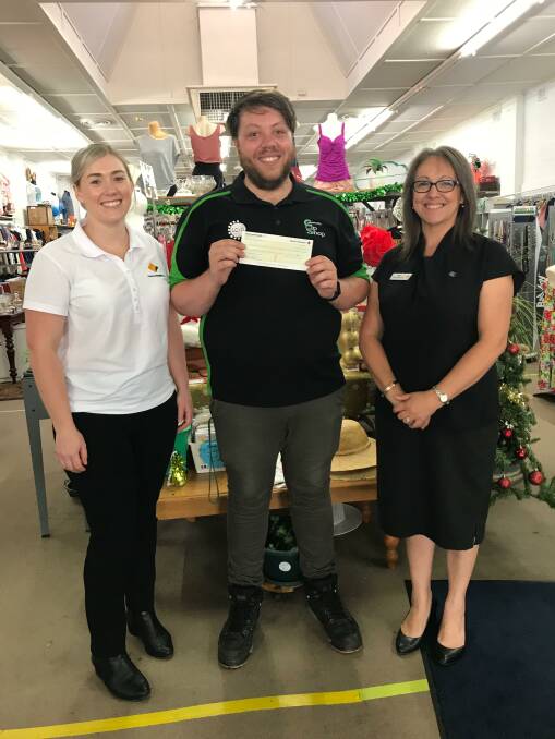 WELL SPENT: Leeton branch staff Andrea Morton (left) and Sue Limbrick with Leeton Community Op Shop's Brady Smith. 