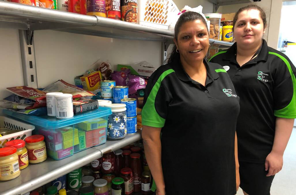 HELP OUT: Kitchen supervisor Bev Moore (left) and store assistant Moesha Goolagong assess the items in the pantry. Photo: Talia Pattison 