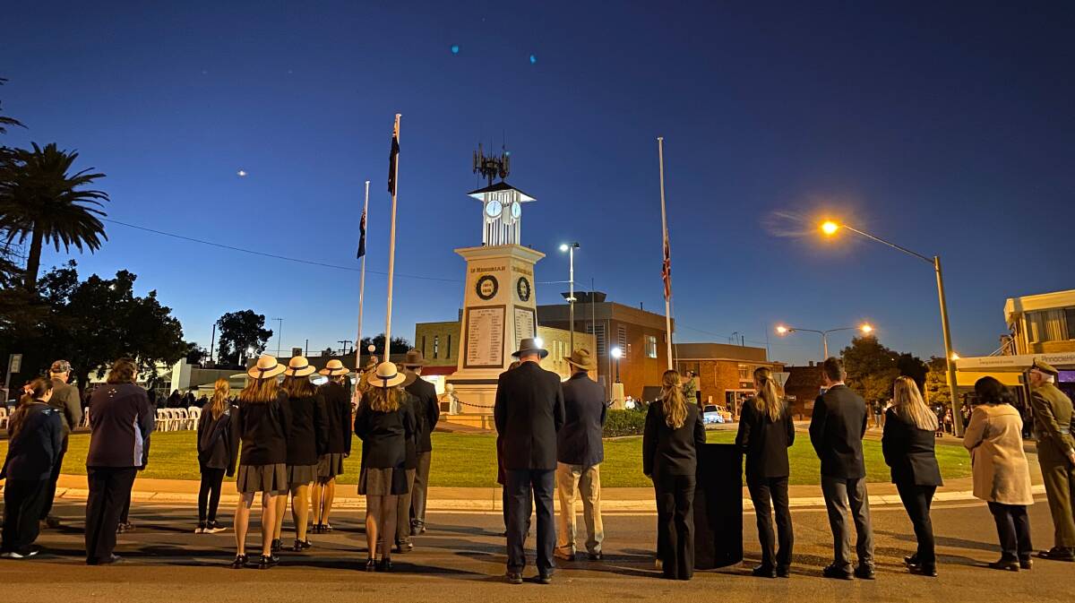 REFLECT: The Anzac Day dawn service allowed for a moment to pause and reflect in Leeton on Sunday morning. Photo: Talia Pattison 