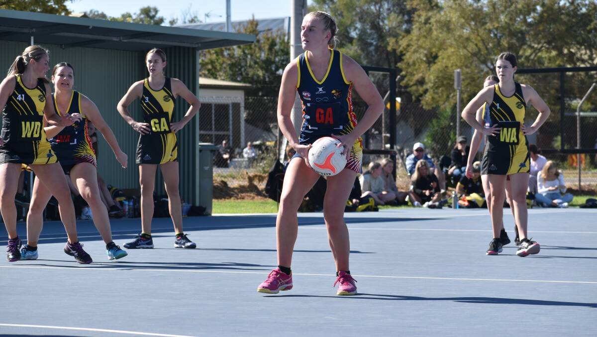 GOOD START: Maddy Clyne looks to move the ball closer to the circle during A grade's round one victory on the weekend. Photo: Liam Warren