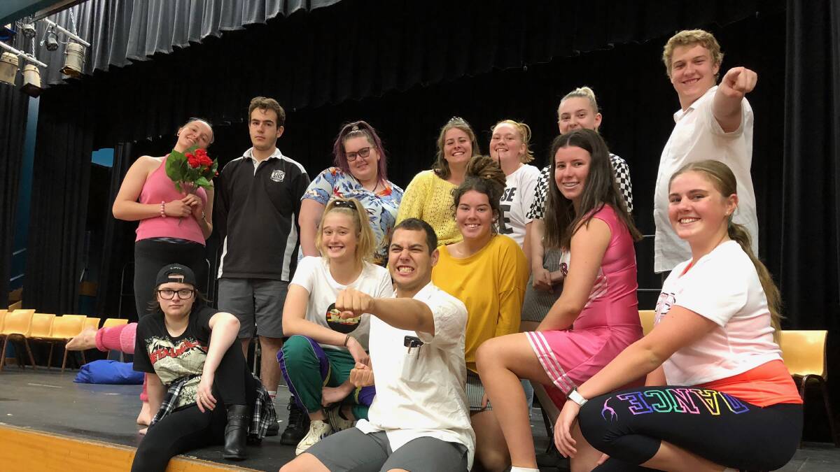 REHEARSE: Some of the cast members of the Back to the 80s musical practice getting into character this week. Photo: Talia Pattison 