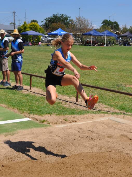 Making a mark in the long jump it. 