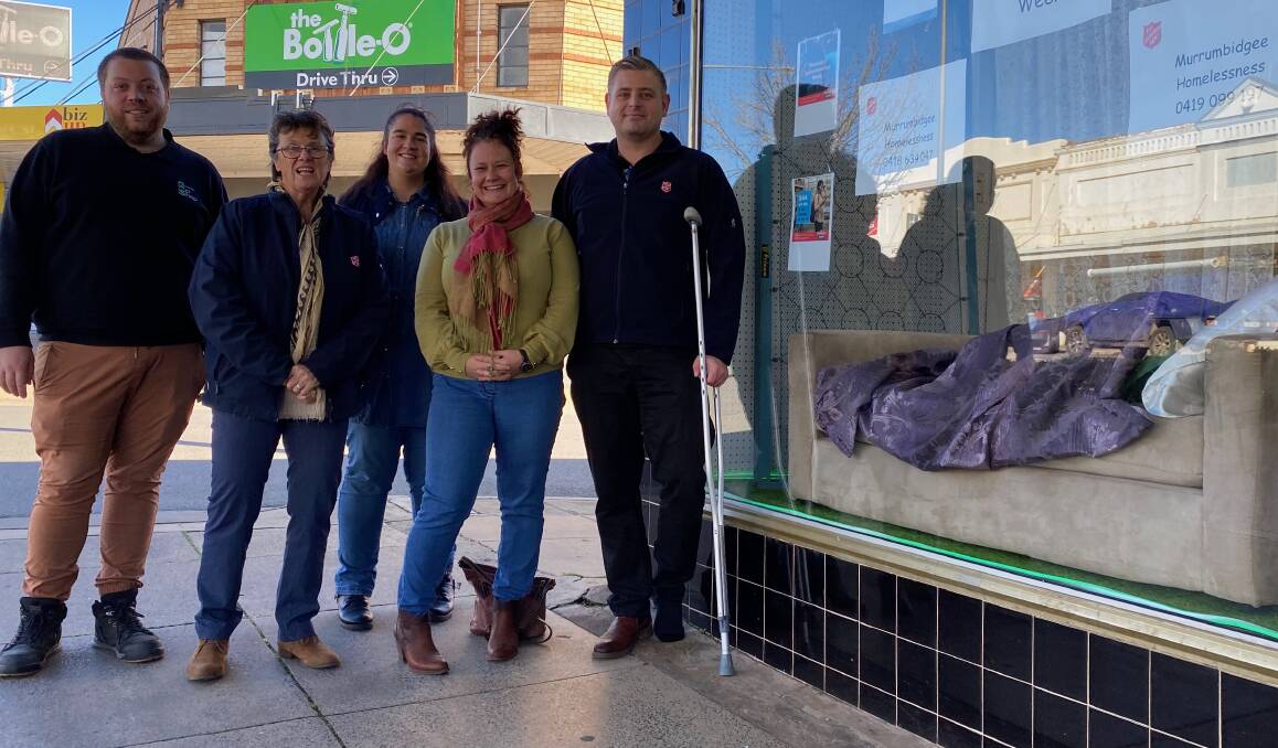 HIGHLIGHT: Leeton Community Op Shop's Brady Smith (left) with Michelle Kilgower, Beth Hawken, Briana Bryon and Luke Wright from the Leeton Salvation Army in front of the window display dedicated to raising awareness of homelessness in the shire. Photo: Talia Pattison 