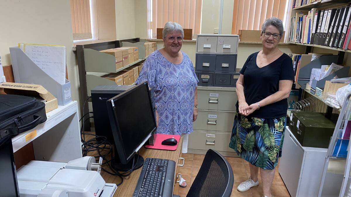 Leeton Family and Local History Society's Wendy Senti (left) and Lyn Middleton are putting the equipment to good use. Picture by Talia Pattison 