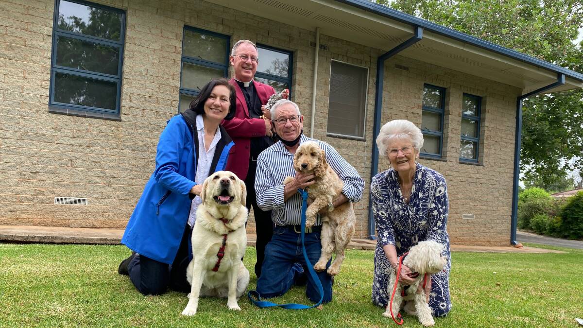 ALL SET: Father Robery Murphy (back) with Helen Birbara, Tim Eurell and Judy Nolan and their furry and feathered friends ahead of the event. Photo: Talia Pattison 