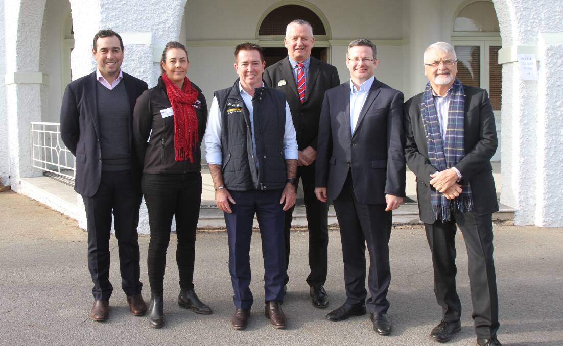 IN TOWN: Leeton shire mayor Tony Reneker (back) with the group during the launch of the NSW GROW program at the Historic Hydro Motor Inn on Wednesday morning. Photo: Talia Pattison 