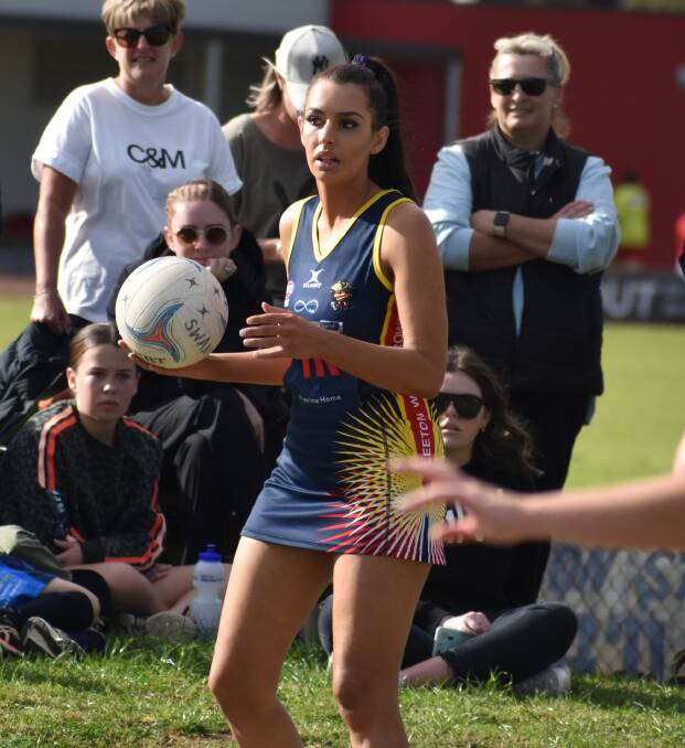 ON THE LOOKOUT: Leeton-Whitton's Taya Panuccio searches down court to offload this pass. Photo: Liam Warren