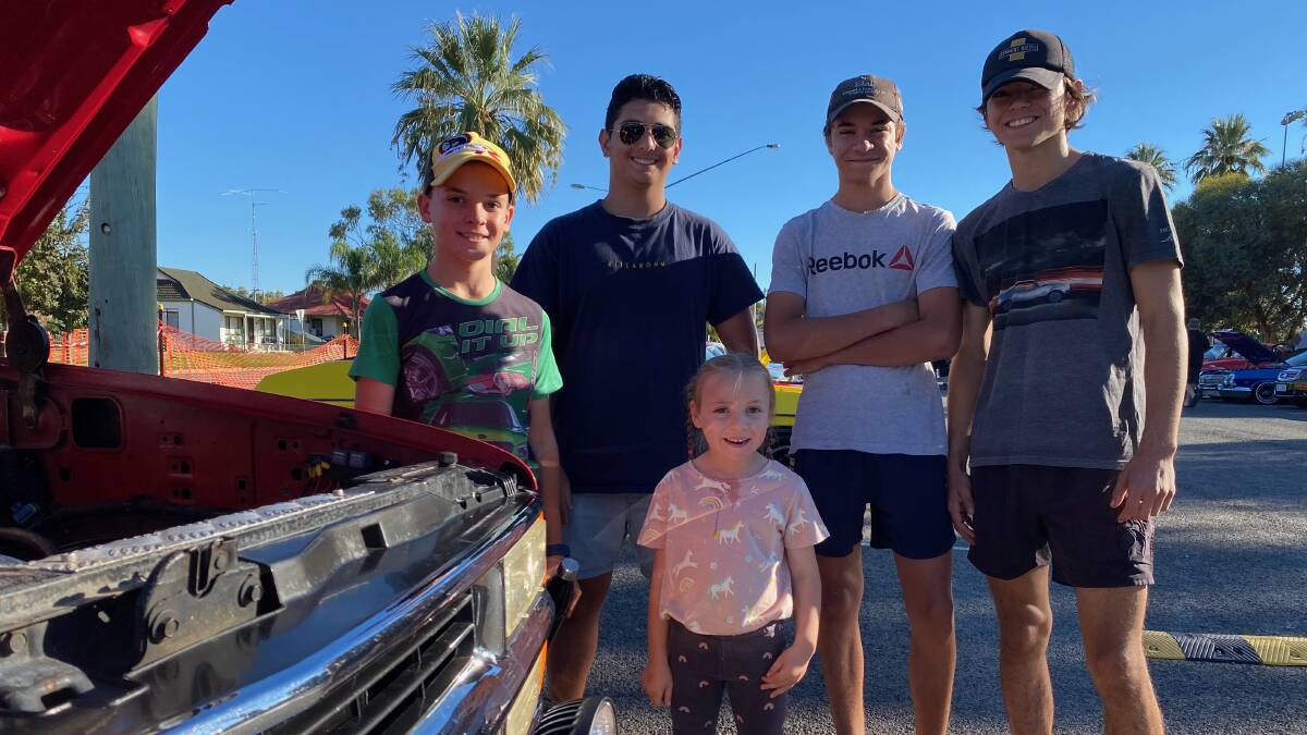 DAY OUT: Jed Longhurst, Remy Pages, Darcy Longhurst, Charlie Longhurst and (front) Sophie Longhurst enjoy the show and shine. Photo: Talia Pattison