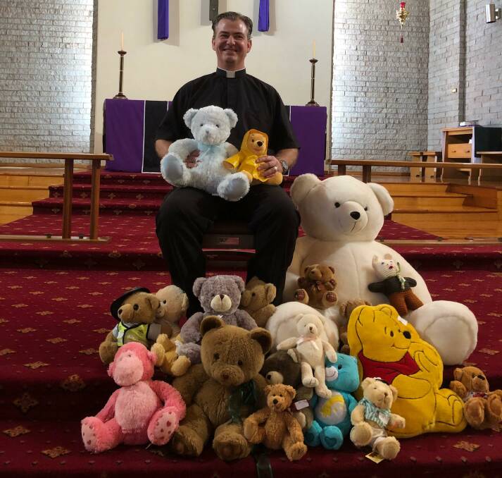 FURRY FRIENDS: Deacon Tim Kelly and his many teddy bear friends are looking forward to this weekend's event at St Peter's in Leeton. Photo: Talia Pattison