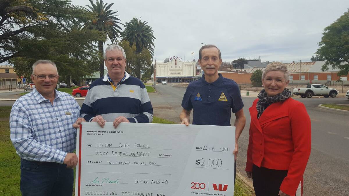 FUND BOOST: Leeton shire councillors Michael Kidd (lef) and Tracey Morris (right) accept the donation from Apex 40 Leeton president Brendan O'Connell and secretary Mark Carter. 