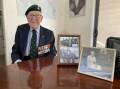 At 103-years-old, World War II veteran John Wilkinson, who lives in Leeton, has reflected on his service. Sgt Major Wilkinson is pictured with photographs from his time in New Guinea, as well as his late wife Joan. Picture by Talia Pattison