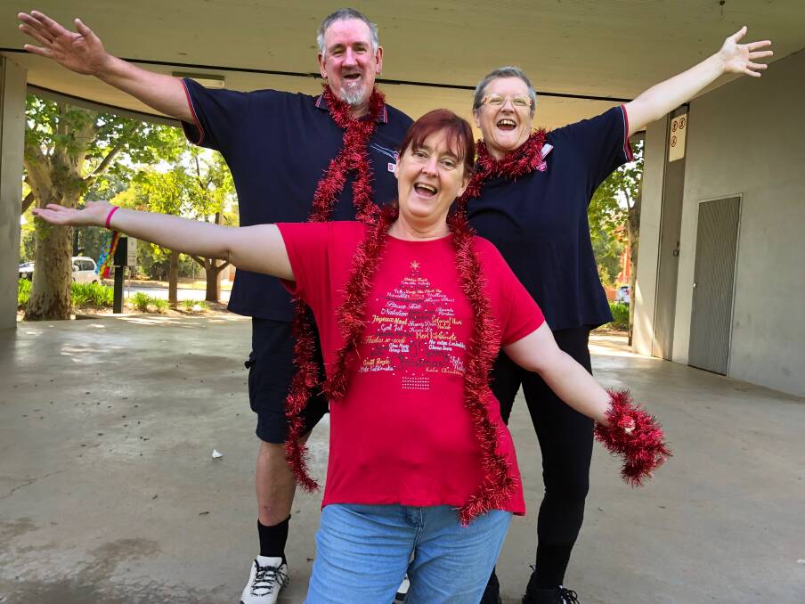 SING ALONG: Carols in Park will this year be hosted by the Leeton Salvation Army, with (back) Tony Kay, Katrina Cooper and (front) Wendy-Sue Swann all ready to go on the Mountford Park stage. Photo: Talia Pattison