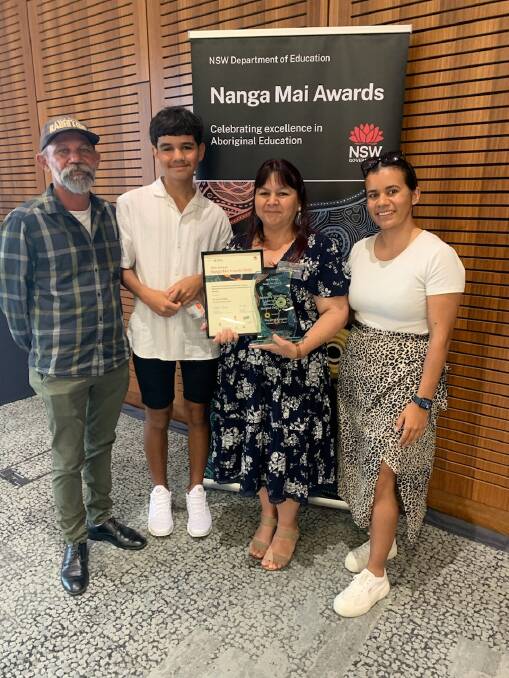 Parkview Public school learning support officer with her family at the awards ceremony in Sydney recently. Picture supplied 
