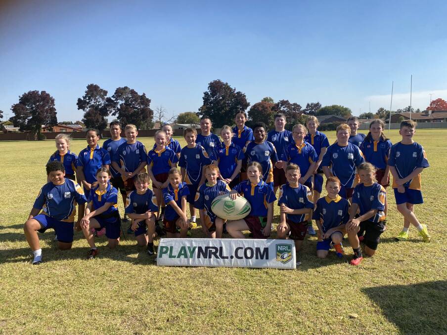 BIG DAY: Leeton Public School's rugby league and league tag sides after winning round one of the Mortimer Shield competition. Photo: Supplied