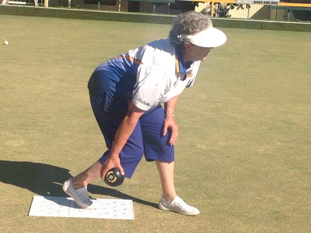 READY TO ROLL: Leeton and District's Joan Bourke prepares to send one down the green. Photo: Contributed 