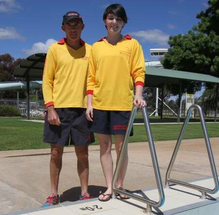 BEAT THE HEAT:  Lifeguard Jo Irvine (right) and pool supervisor Dennis Irvine will be on hand during the hot weather to keep swimmers safe.
