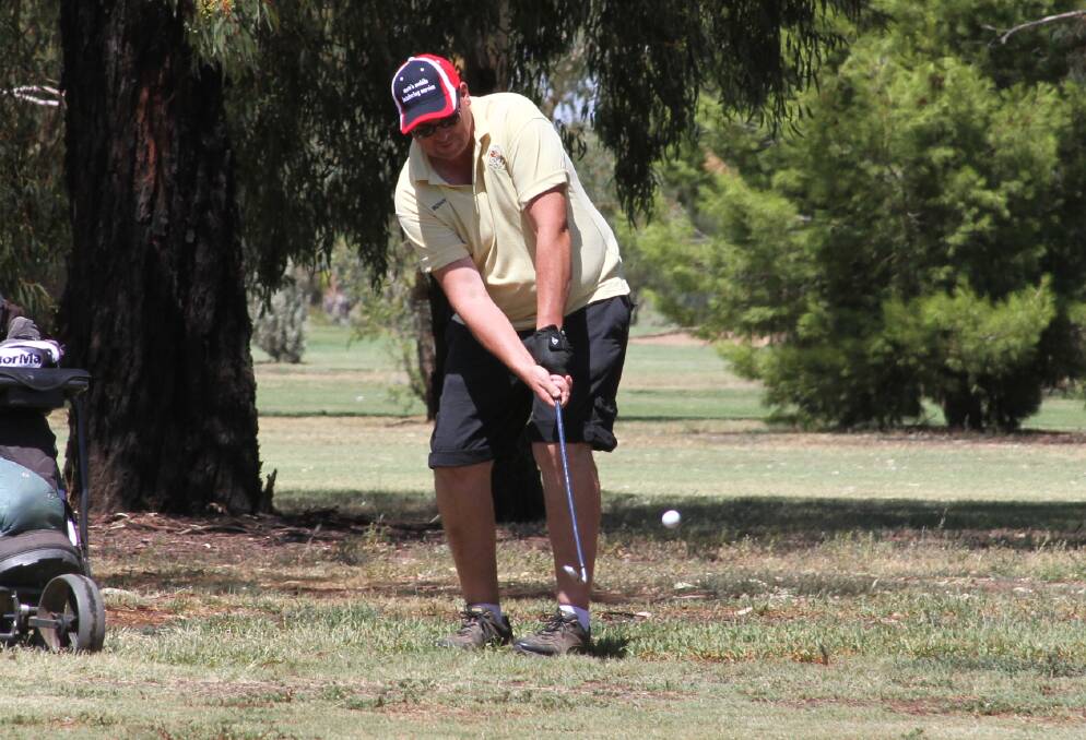 AIM AND FIRE: Aaron Bush from Yanco plays a round of golf at the Leeton course recently. The twilight competition is ramping up ahead of finals. Photo: Ron Arel 