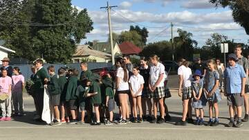 Students and community members participated in the Whitton town march and service. Pictures supplied 