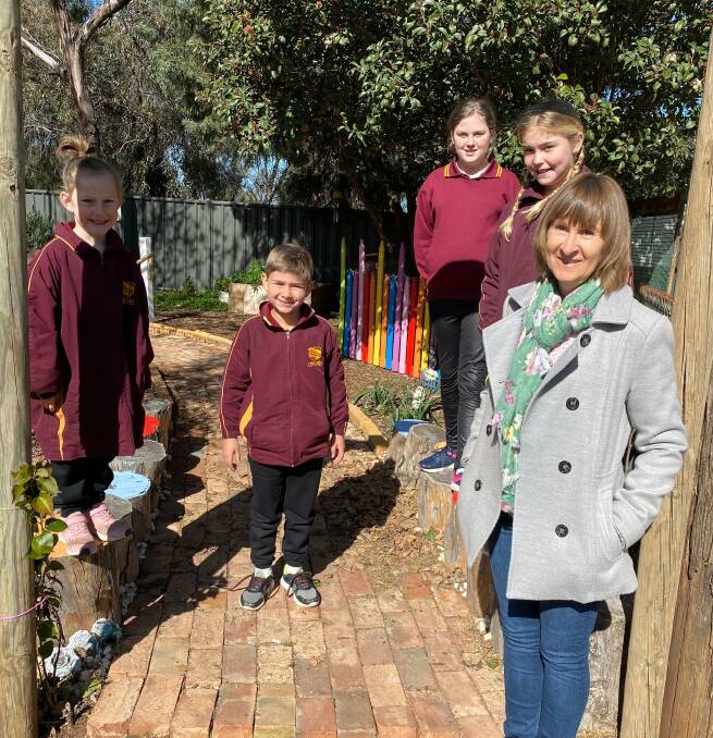CATCH UP: Wamoon Public School students (from left) Jacinta Bradshaw, Braxton Johnson, Brea Kefford and Hailey Granger with school chaplain Julie Withers. Photo: Talia Pattison 