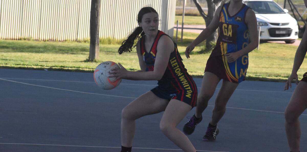Maddy Kennedy looks for a team mate last season when the Crows met the GGGM Lions at the Leeton Showground. Picture by Liam Warren