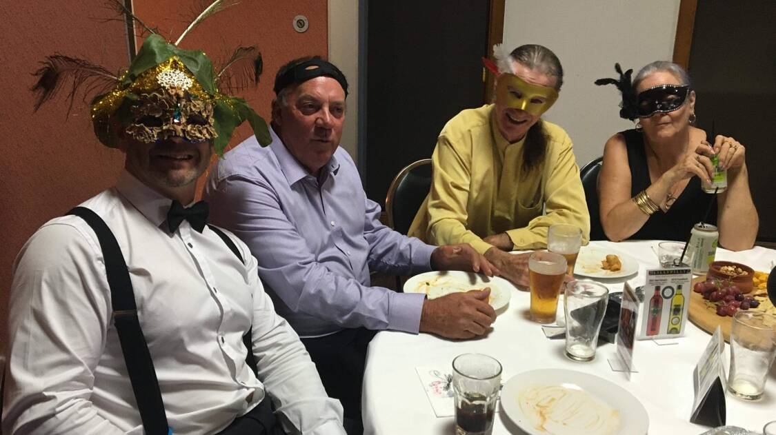 FUN NIGHT: Masks of all varietities were spotted at the Rotary Club of Leeton event. Photos: Supplied