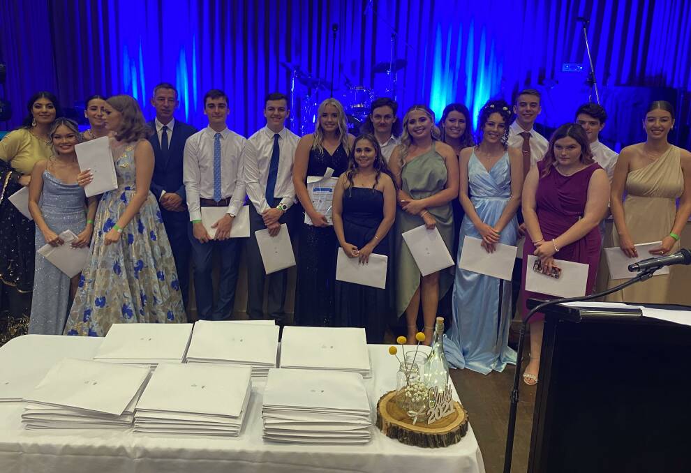 ALL DONE: Students from St Francis College celebrate their year 12 graduation recently. Photos: Supplied