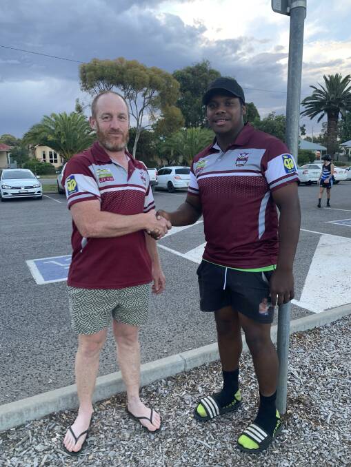 WELCOME: Yanco-Wamoon president Rodney Coelli (left) welcomes new signing to the club Elwyn Ravu Jr. Photo: Haley O'Connell