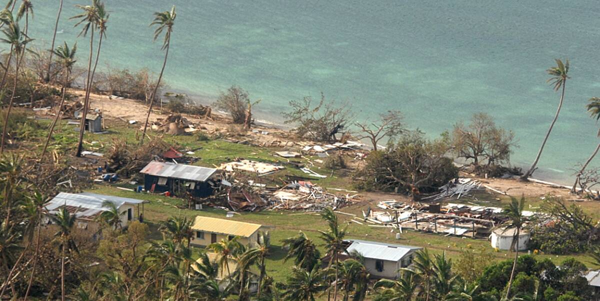 DAMAGE: This photo, taken by the New Zealand Defence Force, shows debris scattered around damaged buildings at Susui village in Fiji as a result of Cyclone Winston. 