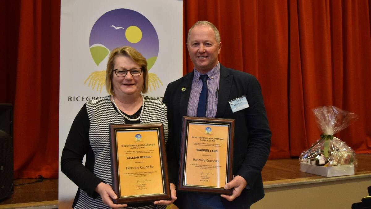 HIGHLIGHT: Leeton shire's Gillian Kirkup (left) and Finley's Warren Lang were awarded the Ricegrowers' Association of Australia's honorary councillor status in 2017. Mrs Kirkup described it as one of the highlights of her career. 