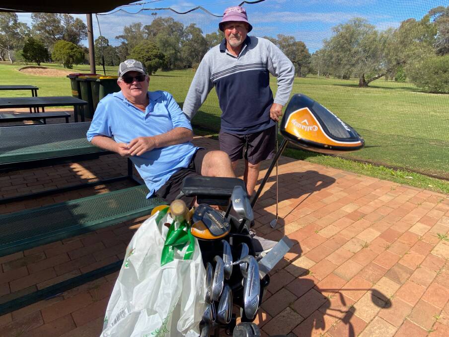 ON COURSE: Leeton's Peter McCormick (left) and Geoff McKenzie prepare for a round at the Leeton golf course. Photo: Talia Pattison