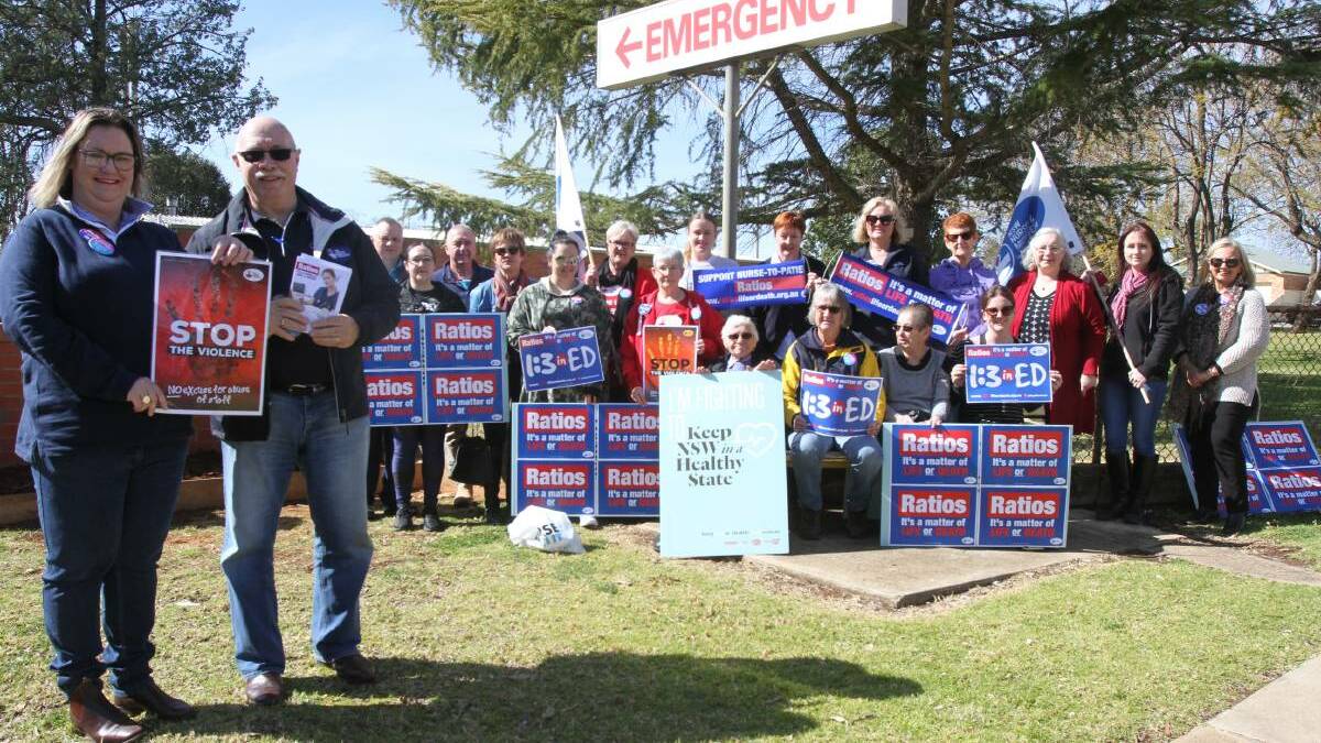 NSW Nurses and Midwives' Association, Leeton branch president Robyn Whittaker (left) at a previous rally at the Leeton District Hospital with other nurses and hospital staff.