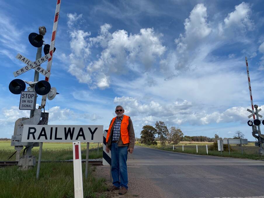 ON SITE: Councillor Maytom at the Regular Road railway crossing. Photo: Talia Pattison