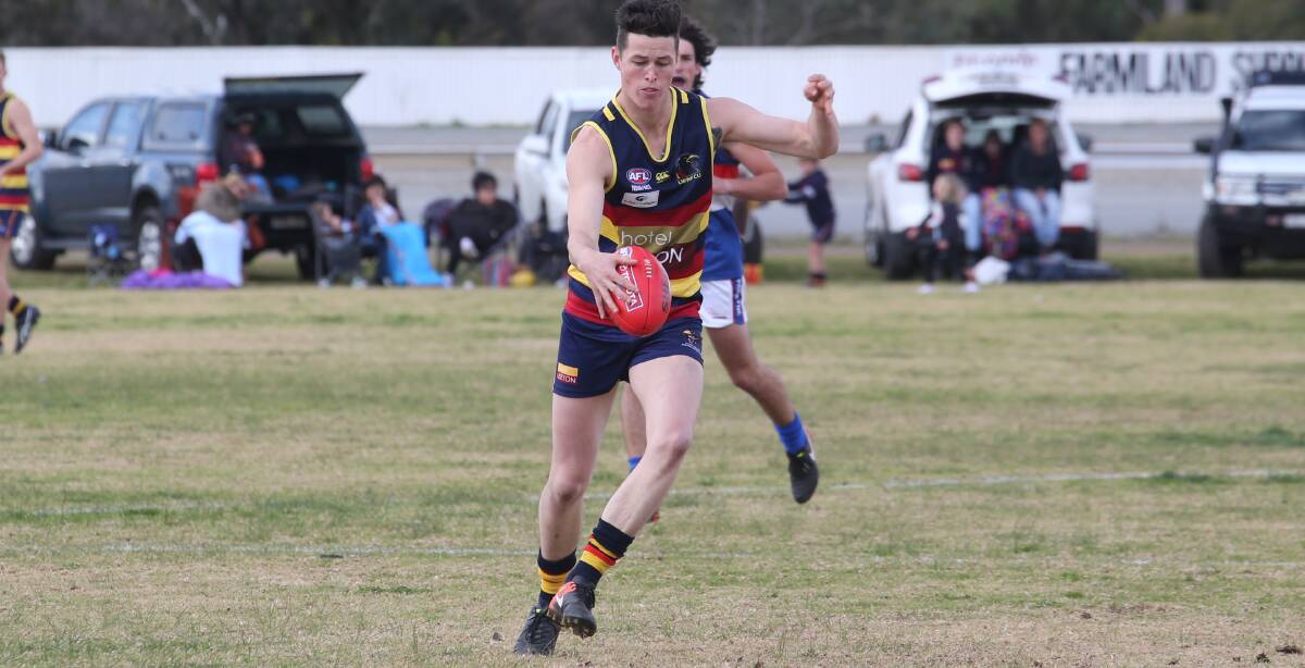 WORKING ON CONSISTENCY: Leeton-Whitton’s Luke Potter gets a kick away against Turvey Park last weekend. Photo: Anthony Stipo 