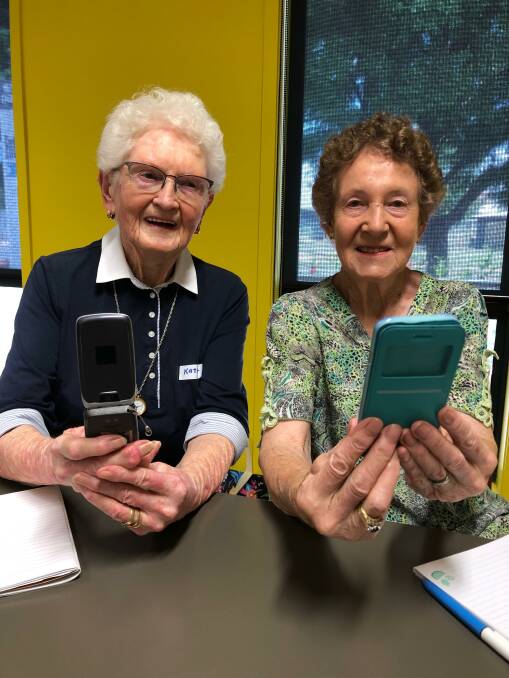 UP-TO-DATE: Taking part in the Seniors Week digital workshop in Leeton was Kathie Kenny (left) and Bernice Rourke. Photo: Talia Pattison