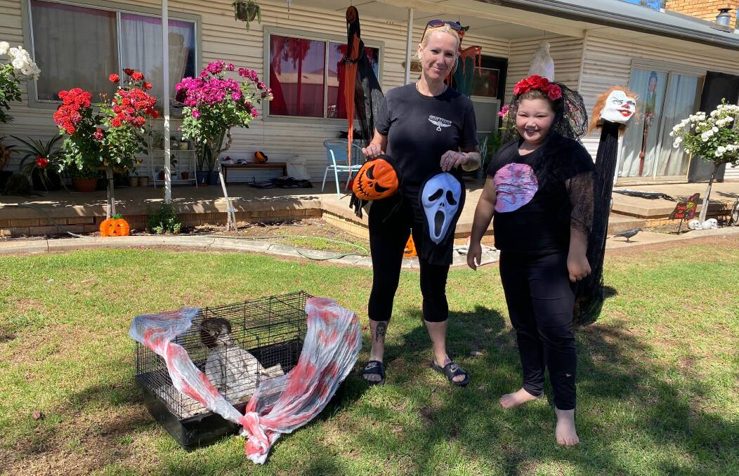 SCARY WITH SIDE OF FUN: Jodie Salerno and daughter Sam, 10, are hoping residents take a drive by their home on Saturday. Photo: Talia Pattison