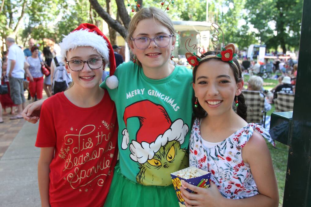 Lucy Gilmour, Jorja Reilly and Montana Nardi enjoy all of the fun of Light Up Leeton in Mountford Park on Sunday afternoon. Picture by Talia Pattison 