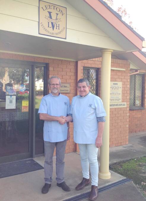 CHANGE OF HANDS: Dr Peter Brunsdon (left) and Dr Brian Munro at the Leeton Veterinary Hospital. Photo: Supplied 