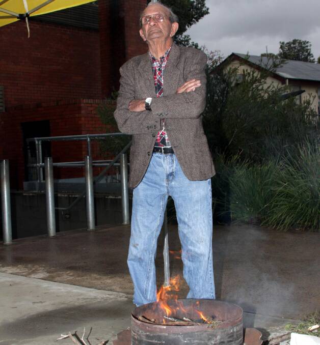TRADITION: Wiradjuri Elder Jimmy Ingram prepares to hold a smoke ceremony to cleanse the new amphitheatre. Photo: Ron Arel  