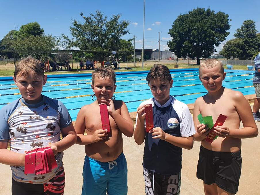 RIBBONS: Students from Wamoon Public School were competitive in the pool during the recent small schools carnival. Photos: Supplied