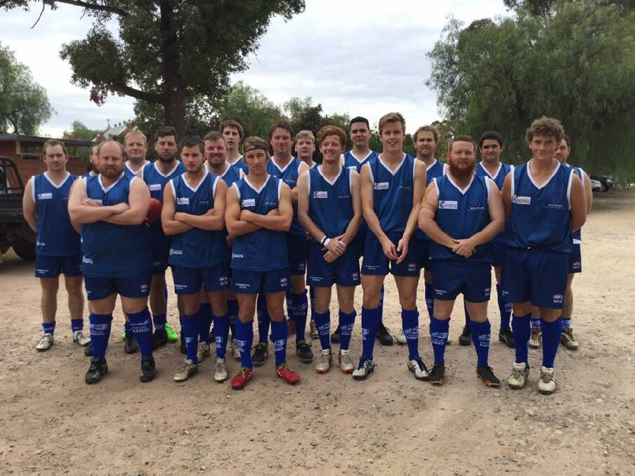 GOOD CAUSE: The Barellan Two Blue reserve grade side shows off their socks as part of Saturday's "sock it to MND" awareness event.