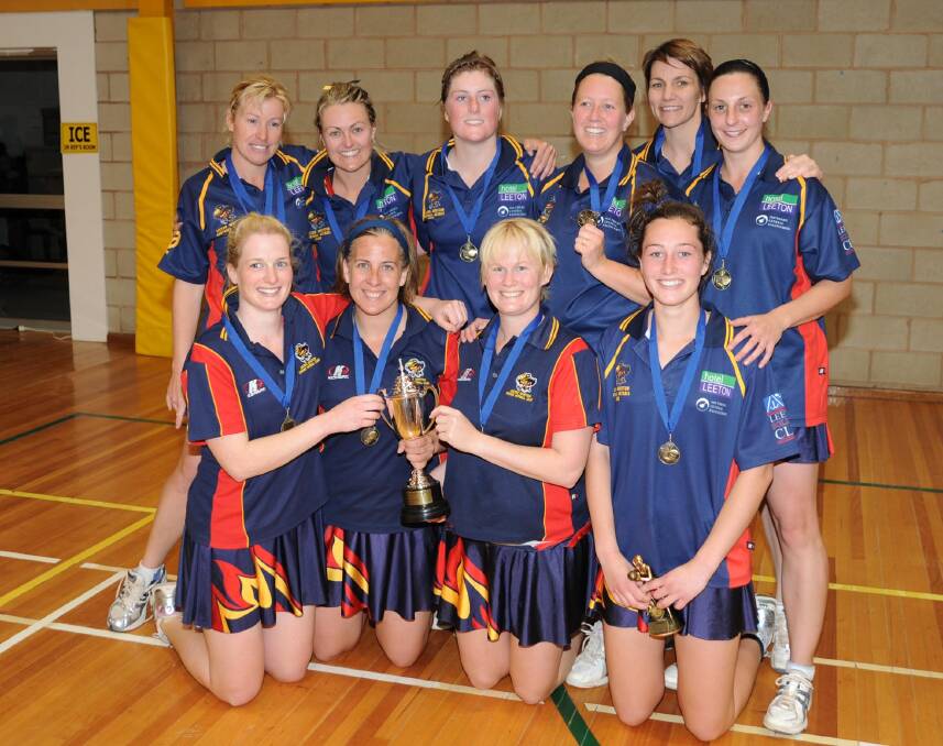 Rachal Broadbent (front, second from right) with her A grade team mates after winning the premiership in 2009. 