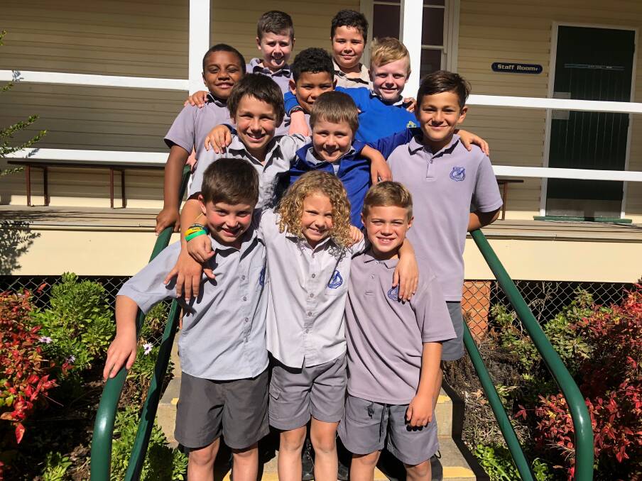 WELL DONE: The Leeton Public School's year 3 and 4 rugby union team celebrates their recent successes. Photo: Talia Pattison