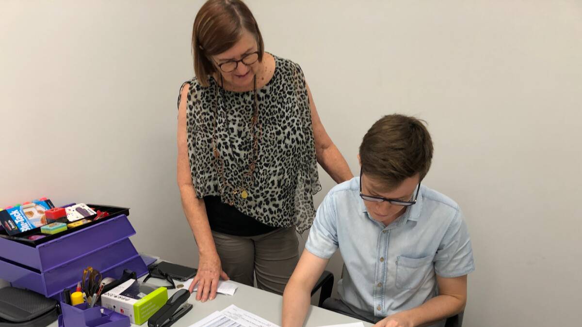 WORKING TOWARDS GOAL: Sue Gavel and Ryan Scifleet from Leeton Connect go over some of the ins and outs of where things are at. Photo: Talia Pattison 